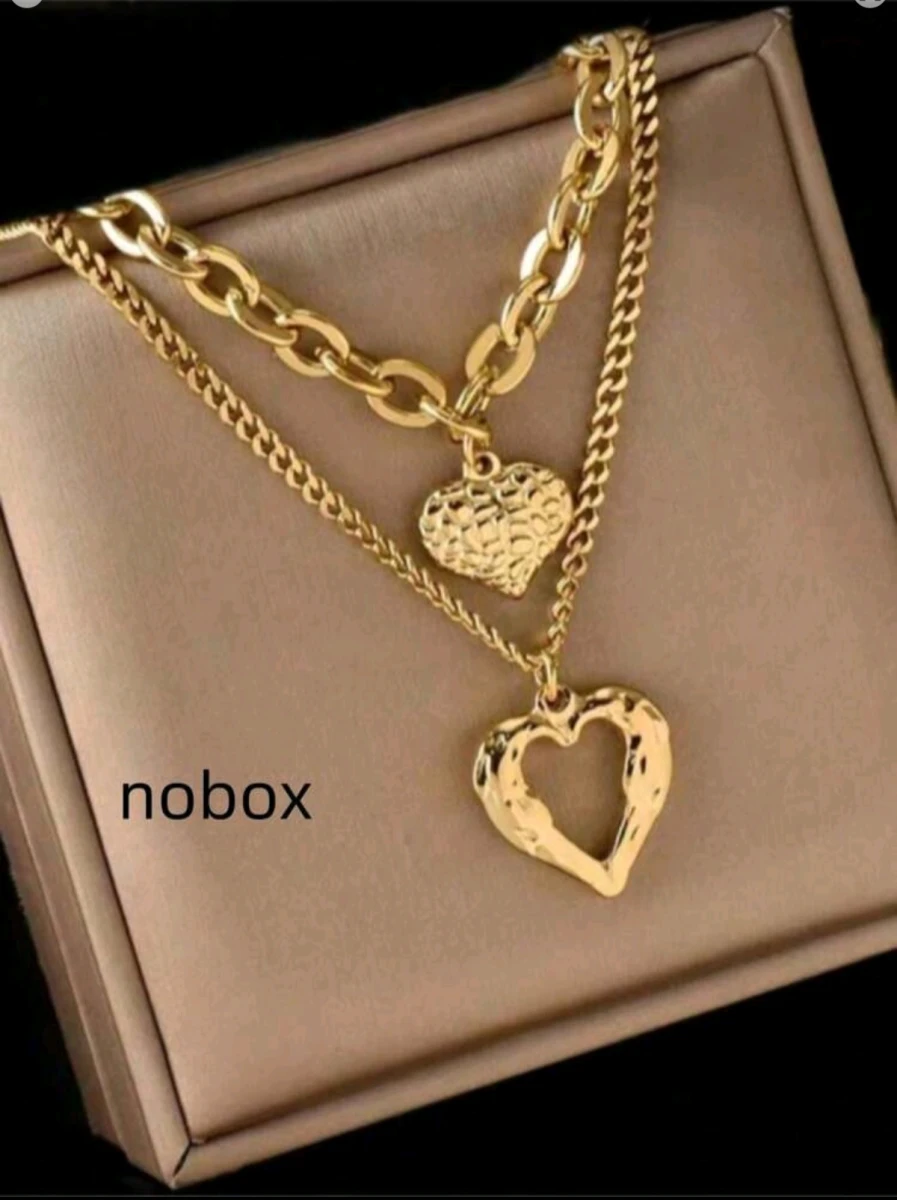 Juego de collares color dorado con detalles de corazón