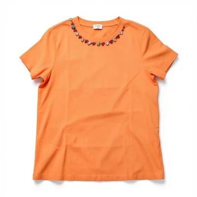 BLUSA BASICA NARANJA DE PIEDRAS EN EL CUELLO